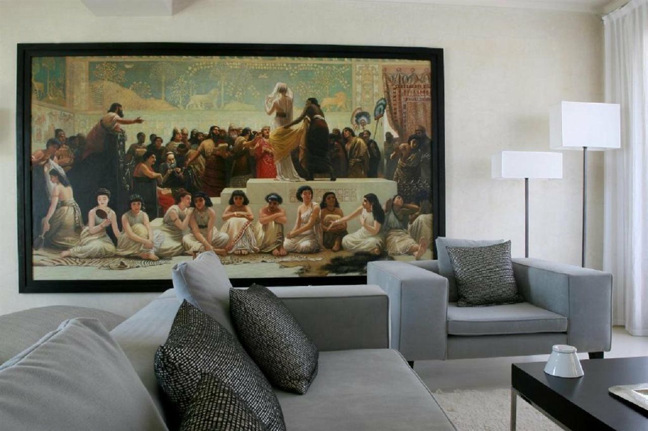 Hotel Les Jardins De La Koutoubia Marakéš Exteriér fotografie A living room with a painting